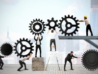 Teamwork works together to build a gear system