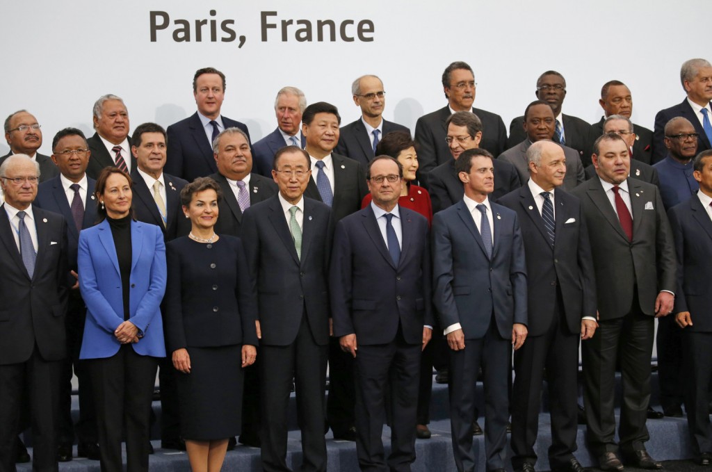 World leaders pose for a group photo at the COP21, United Nations Climate Change Conference, in Le Bourget, outside Paris, Monday, Nov. 30, 2015. (AP Photo/Jacky Naegelen, Pool)