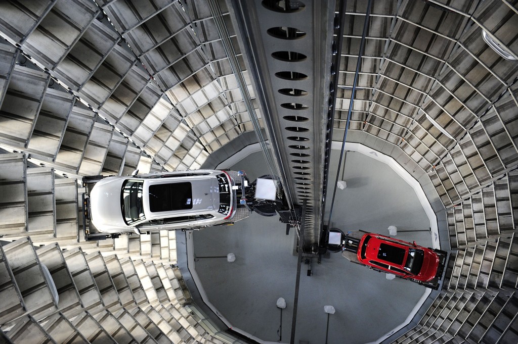 WOLFSBURG, GERMANY - MARCH 10: A brand new Volkswagen Passat and Golf 7 car are stored in a tower at the Volkswagen Autostadt complex near the Volkswagen factory on March 10, 2015 in Wolfsburg, Germany. Volkswagen is Germany's biggest car maker and is scheduled to announce financial results for 2014 later this week. Customers who buy a new Volkswagen in Germany have the option of coming to the Autostadt customer service center in person to pick up their new car. (Photo by Alexander Koerner/Getty Images)