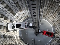 WOLFSBURG, GERMANY - MARCH 10:  A brand new Volkswagen Passat and Golf 7 car are stored in a tower at the Volkswagen Autostadt complex near the Volkswagen factory on March 10, 2015 in Wolfsburg, Germany. Volkswagen is Germany's biggest car maker and is scheduled to announce financial results for 2014 later this week. Customers who buy a new Volkswagen in Germany have the option of coming to the Autostadt customer service center in person to pick up their new car.  (Photo by Alexander Koerner/Getty Images)