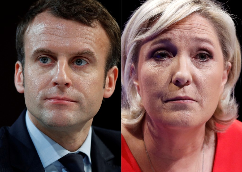 A combination picture shows portraits of the candidates who will run in the second round in the 2017 French presidential election, Emmanuel Macron (L), head of the political movement En Marche !, or Onwards !, and Marine Le Pen, French National Front (FN) political party leader.  Pictures taken March 11, 2017 (R) and February 21, 2017 (L).  REUTERS/Christian Hartmann - RTS13KJY