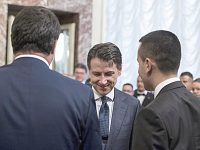 Italian Prime Minister Giuseppe Conte (C) with his vice Prime Ministers Luigi Di Maio (R) and Matteo Salvini (L), prior receiving from the outgoing Prime Minister Paolo Gentiloni the small silver bell to open the First Council of Minister at Chigi Palace in Rome, 1 Jun 2018. ANSA/ANGELO CARCONI