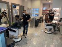 Parrucchiere aperto a Bolzano durante la fase 2 dell'emergenza Coronavirus, Bolzano, 11 maggio 2020. ANSA