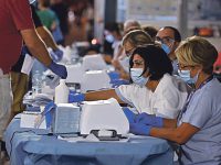 Swab tests for incoming ship passengers from Sardinia at Civitavecchia port near Rome, Italy, 29 August 2020. ANSA/RICCARDO ANTIMIANI