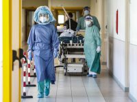 Health workers wearing overalls and protective masks in the intensive care unit of the Tor Vergata hospital during the second wave of the Covid-19 Coronavirus pandemic, Rome, Italy, 26 November 2020. 
ANSA/GIUSEPPE LAMI
