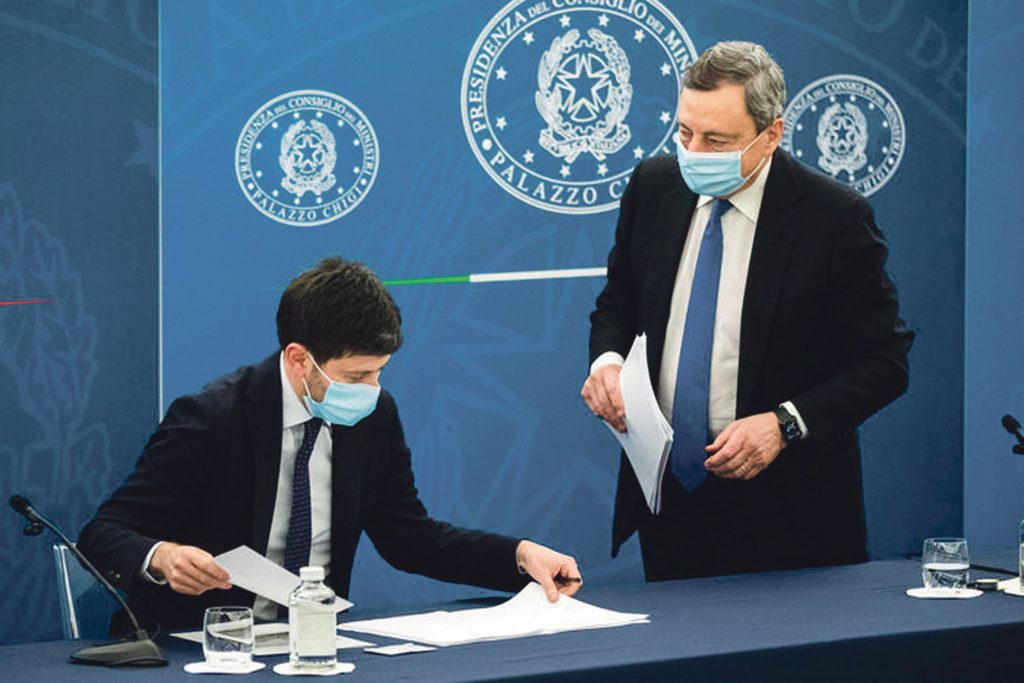 Italian Prime Minister Mario Draghi and Italian Health Minister Roberto Speranza (L) attend a press conference at Chigi Palace, Rome, 16 april 2021. ROBERTO MONALDO/LAPRESSE/POOL/ANSA