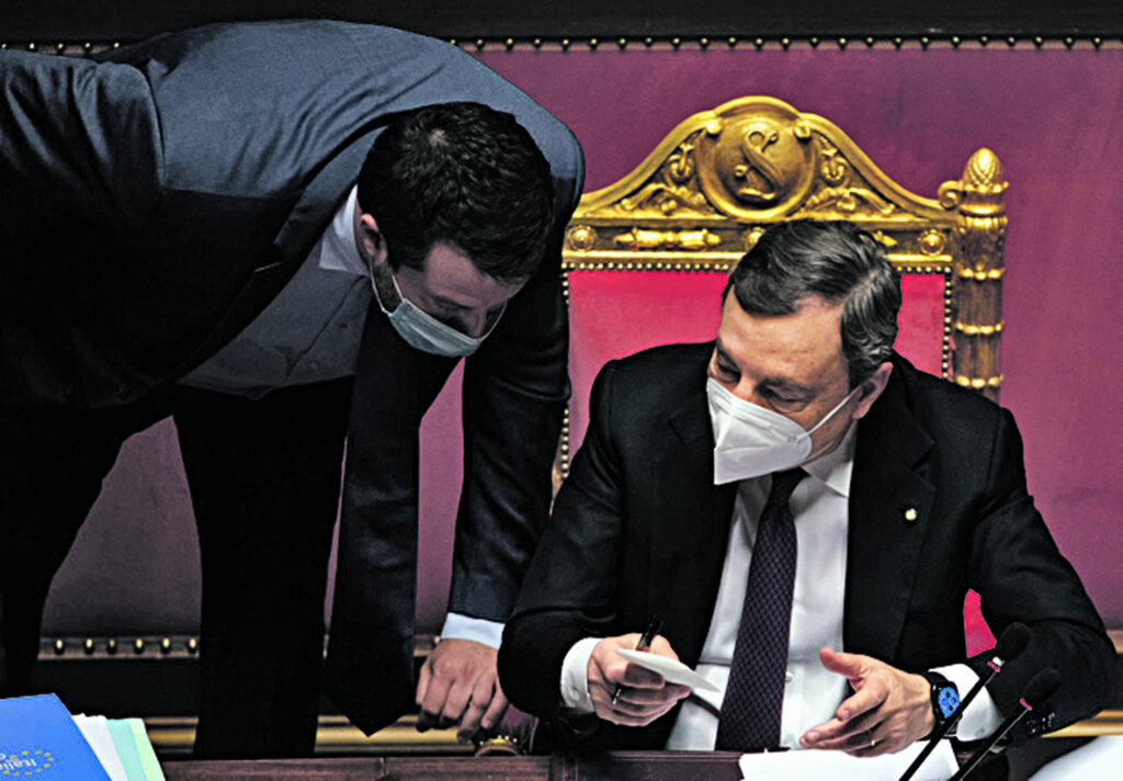 Italian Prime Minister Mario Draghi (R), speaks with leader of Lega, Matteo Salvini, during the debate on Recovery Plan at the Senate in Rome, Italy, 27 April 2021.  MAURIZIO BRAMBATTI/ANSA