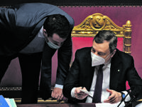 Italian Prime Minister Mario Draghi (R), speaks with leader of Lega, Matteo Salvini, during the debate on Recovery Plan at the Senate in Rome, Italy, 27 April 2021.  MAURIZIO BRAMBATTI/ANSA