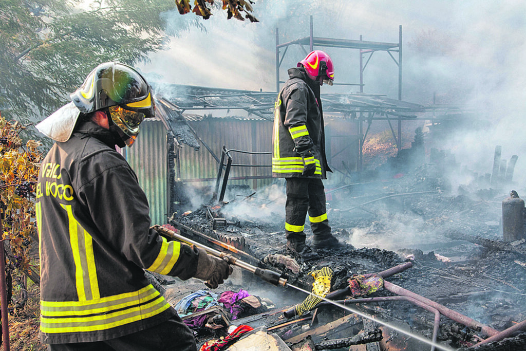 Massarosa, Lucca/Italy - aug 29 2008: firefighters intervene to extinguish a forest fire in the hills of Massarosa in the province of Lucca, Tuscany