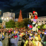 La Fiamma Olimpica accende il nuovo anno e illumina la città